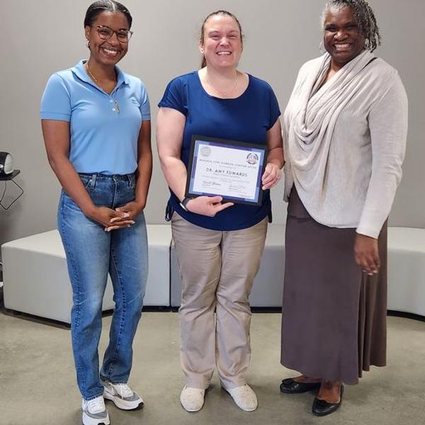 Amy Edwards, Hillview Christian Academy, receives a chapter STEAM grant. Pictured (l-r) are McDonald, Edwards and Johnson.