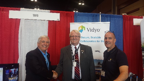 Vidyo, Inc. donated a 32 inch monitor to the chapter at AFCEA's TechNet Augusta in August. Attending the event are (l to r) Robert (Bob) Largent, Vidyo; Chapter President Brian Coffey, CACI; and Phil Curtis Vidyo.