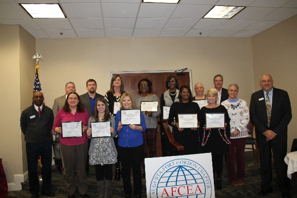 Presenting grants in January are (l-r) Chapter Scholarship Chairman Horace Carney; Jeff Williams, chapter programs; Chuck Kelleher, treasurer; Past President Bob Damen; Small Business Chairman Amy Tuschen; and Vice President Ed Velez. Teachers receiving the awards include (front row, l-r): Amy Edwards of Mossy Creek Elementary; Laura Hromyak of Parkway Elementary; Kathleen Murray of Lakeside Middle; Vanesia McMillian of Freedom Park Elementary; Suzanne Mayson of Warren Road Elementary; (back row, l-r) Shari Hayes, representing Britton Serigney of Evans High; Lashonda Tankersly of Hains Elementary; Jennifer Donaldson of Southside Elementary; and Sue Cottingham of Grovetown Middle. 