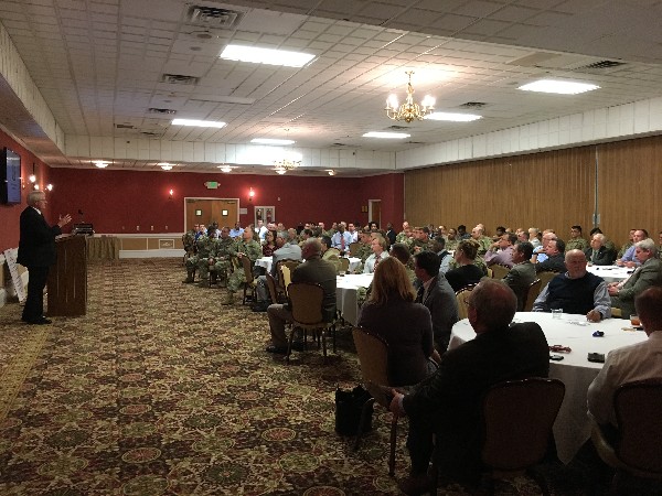Chapter President Brian Coffey welcomes the audience to an exciting Lunch and Learn in March. 