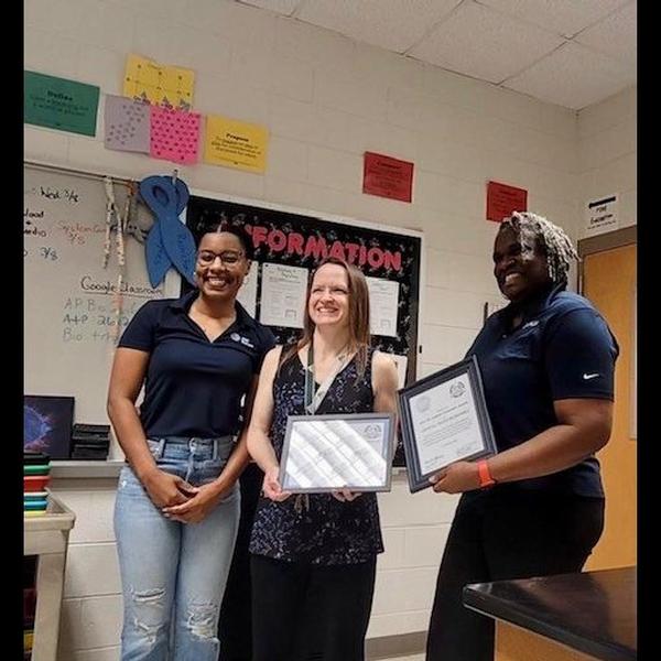 Crystal Davis MacDowell is awarded the Dr. Sandra Carraway Award for her outstanding service as a standout teacher at Greenbrier High School. Pictured are Justine McDonald, MacDowell and Melissa Johnson.