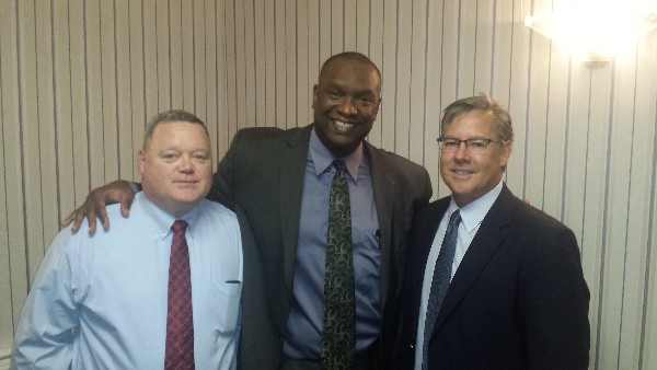 Greeting September luncheon speaker Chestnut (c) are Jeff Williams, chapter vice president for programs (l) and Bob Damen, chapter president.