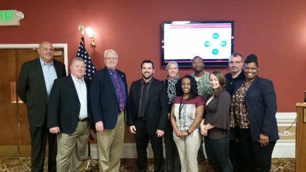 Attending the chapter's March Lunch and Learn are (l-r) Ed Velez, chapter vice president; Jeff Williams, chapter vice president of programs; Brian Coffee, chapter president; Dellamano; McLeish; Connie Tyler, Raytheon; Anthony Paris; Anna Catadul; Glen Blankenship, Raytheon; and Brenda Howard, chapter secretary.