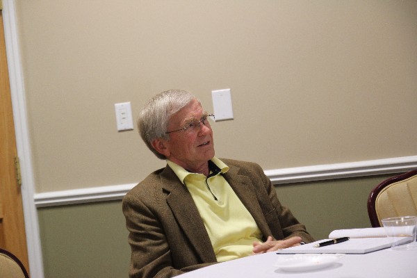 Attendee Dennis Moen asks questions about cyberthreats at the event in February.