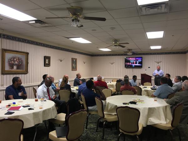 Chapter Vice President Myron Burrito thanks theClubhou.se presenters after their July presentation and tells chapter members about key upcoming events.  