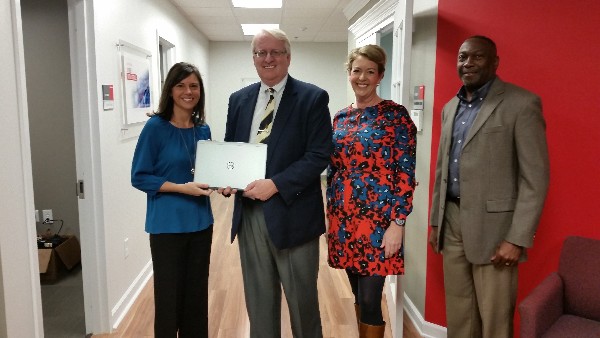 (l-r) Adrienne Patterson, resource development director, Boys and Girls Club, Coffey, Kennedy and Cotton make a presentation to the Central Savannah River Association Boys and Girls Club in January.