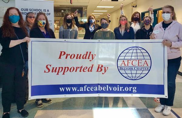 In March, Jamey Chianetta, principal, gathers with teachers of Fort Belvoir Elementary School and chapter members as teachers are given gift cards to support STEM programs. "We are truly so grateful for AFCEA and their continued generosity on behalf of our teachers." 