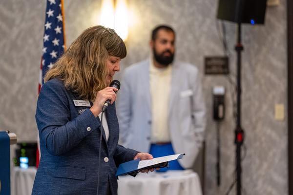 A record-breaking start to the season—Chapter President Mollie Pearson welcomes a sold-out crowd of 120 attendees to the chapter's September Luncheon—the largest turnout in recent chapter history and the perfect way to open the new fiscal year.
