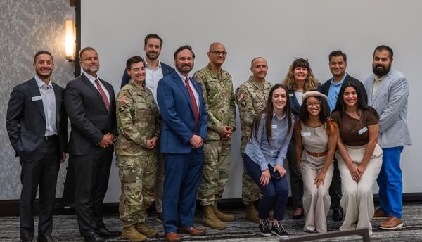 Behind every great event is a dedicated team! The chapter's record-setting September Luncheon came together thanks to the outstanding participation of the AFCEA Belvoir Chapter Board. We're grateful for their leadership and commitment to bringing our community together. Pictured are (l-r) Ali Kavianpour, chapter vice president, Scholarship; Rich Licata; Col. LJ Freeland; Kevin Connors, chapter vice president, Sponsorship; Doug Haskin; Col. Matthew Paul; Que Hajdini, chapter events chair; Mollie Pearson, chapter president; Kyla Hayes, chapter vice president, Strategic Communications; Doan Chau, chapter executive vice president; Karen Tavarez, chapter vice president, Programs; and Viplav Patel, chapter vice president, Emerging Leaders.