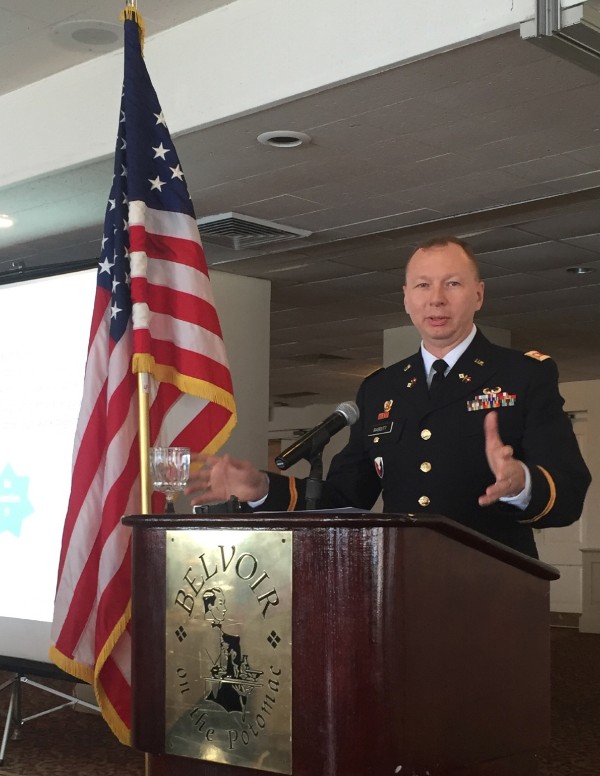 Lt. Col. Joel Babbitt, USA, product director, Wideband Enterprise Satellite Systems (WESS) shares a practitioner's view of making acquisition rapid at the March luncheon.