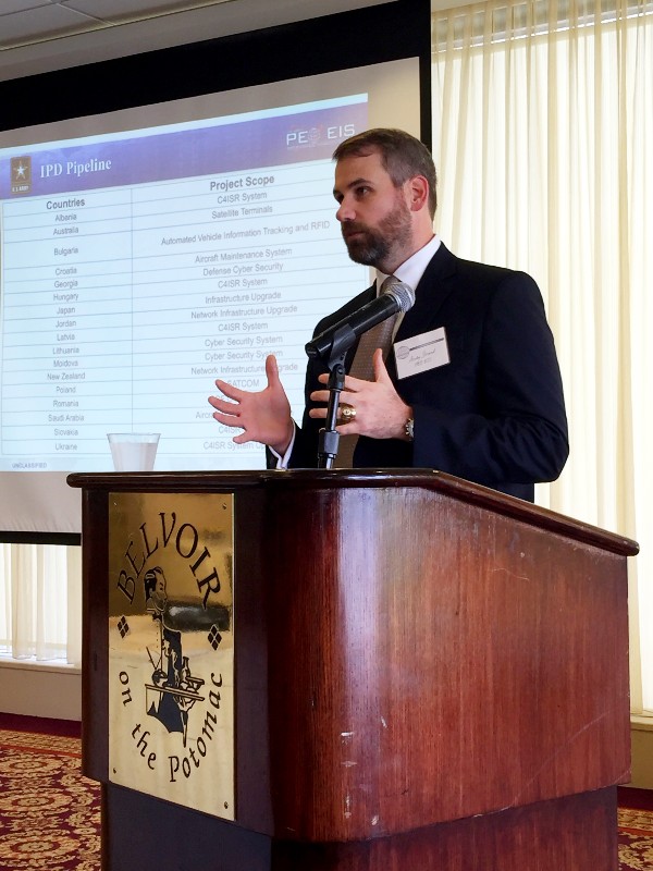 Andy Strand of the Army's Program Executive Office, Enterprise Information Systems, discusses the unique attributes of Foreign Military Sales funding sources, among other topics, at the chapter's small-business networking event in August.

the unique attributes of FMS funding sources