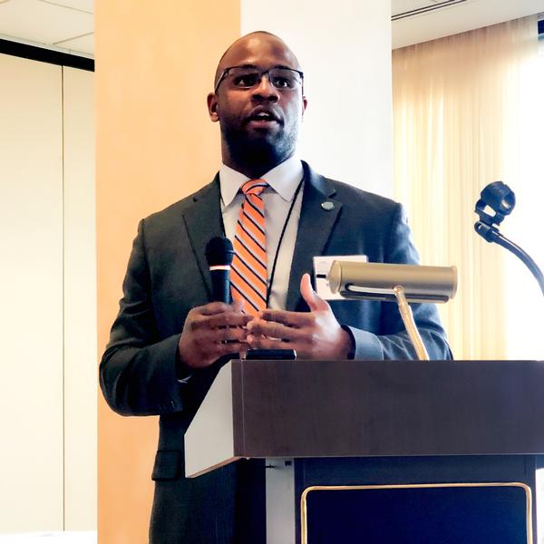 Robert (Rob) Stewart Jr., director of acquisition and technology innovation in the Office of Small Business Programs, Defense Threat Reducing Agency, speaks to participants at the chapter's February small business networking event.