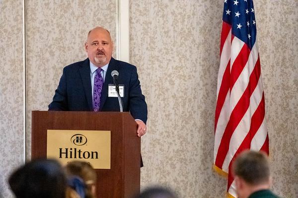 Bill Hepworth, deputy program executive officer, Enterprise Information Systems (PEO-EIS), addresses a sold-out chapter event in June.