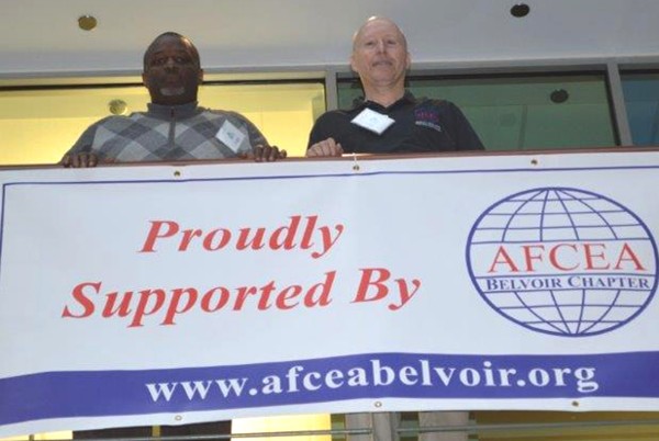 Jones (r) and Reggie Vaughn, chapter vice president for education, help represent the chapter during the Prince William County Science Fair in March.