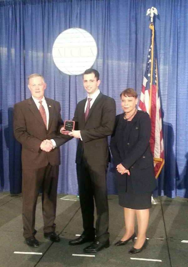 Shaer (c) accepts the 2014 Distinguished Young AFCEAN Award from Gen. Shea and Gooden at West in February.