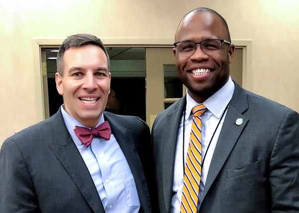 Stewart greets chapter member Eric Strauss at the February  network event.