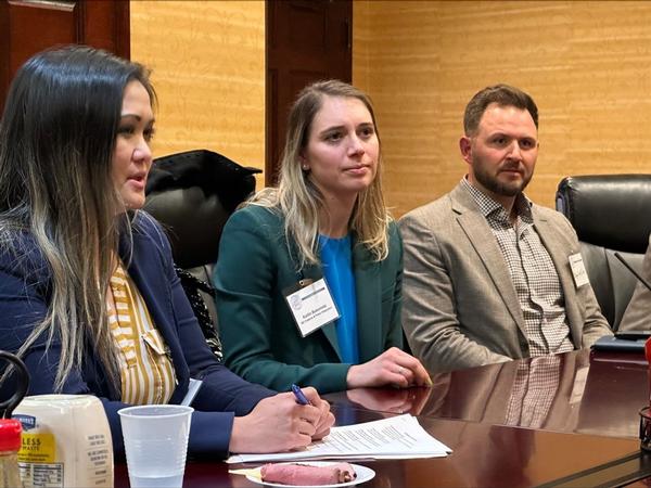 Kaitlin Bulavinetz and team are entrenched in discussion at the February roundtable.