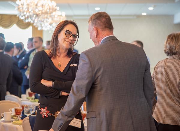 Cherie Smith, program executive officer, Enterprise Information Systems, engages with industry at the January luncheon.