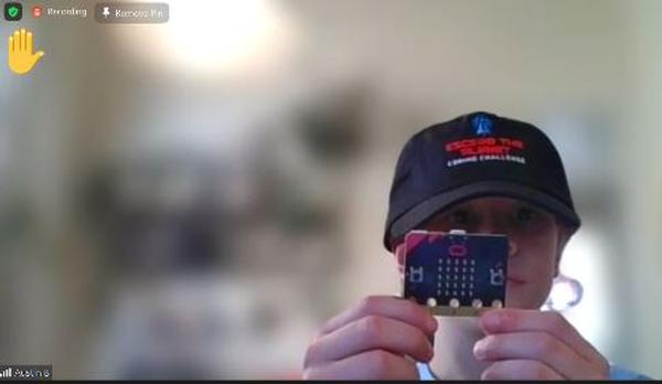 Grace Levin, 10, learns to make a circuit at the December event.