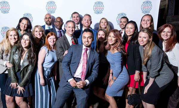 The chapter's Young AFCEANs enjoy the Fiscal New Year networking event in October, which raised money for the Challenger Center.