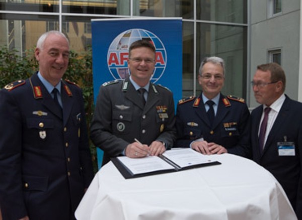 At the signing of a new cooperation bewteen the chapter and the German Armed Forces Association are (l-r) Gen. Maj. Dr. Ansgar Rieks, chapter vice president; Lt. Col. Andre Wustner, president of the German Armed Forces Association; Gen. Maj. Erich Staudacher, chapter president; and Christian Hartrott, chapter secretary. 