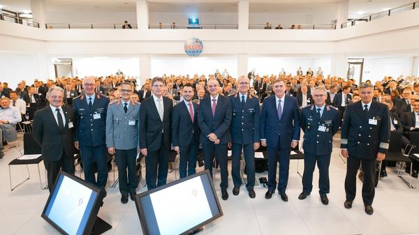 AFCEA Europe General Manager Maj. Gen. Erich Staudacher, GEAF (Ret.) (l), pauses for a photo with high-ranking speakers and guests in August at the 12th Koblenz IT Conference.