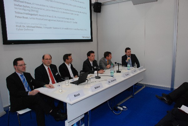 Experts from federal agencies and ministries discuss organized cybercrime and espionage in Hannover, Germany, in March.