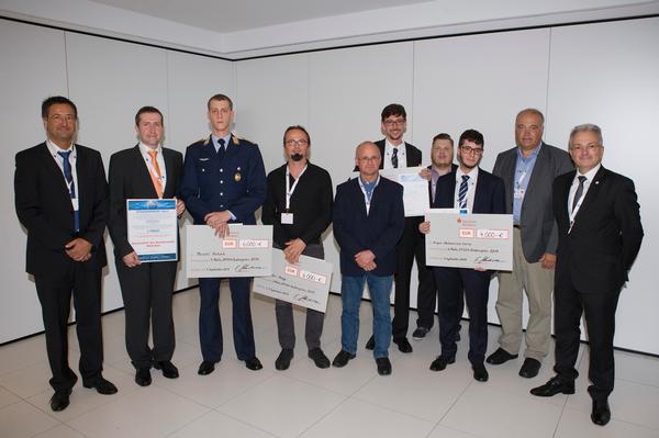 Attending the IT Symposium in September are (l-r) AFCEA Study Award winners and their professors Wunder; Eiseler; Lt. Antzek;  Alexander Hagg; Alexander Asteroth, professor, Hochschule Bonn-Rhein-Sieg; Olaf Lambert; Hans Helmuth Schäfer, professor, Hochschule Bonn-Rhein-Sieg; Sergio Valmorisco Sierra; Peter Martini, professor, Universität Bonn; and Gen. Staudacher.