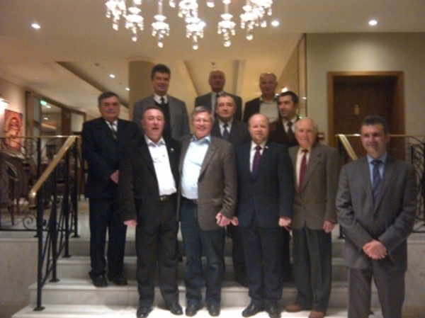 Joining together in March are (front row, l-r) Col. Liviu Cosereanu, ROA, chapter president; Maj. Gen. Klaus-Peter Treche, GEAF (Ret.), general manager, AFCEA Europe; Petr Jirasek, regional vice president, Central Eastern Europe; Brig. Gen. Nicolae Irimie, ROA (Ret.), founder and first chapter president; Calin Pantea, general manager, MARCTEL; (2nd row, l-r) Col. Mihai Palfi, ROA (Ret.), chapter vice president; Lt. Gen. Dumitru Cristea, ROA (Ret.), Romanian Science Academy, Military Section; Lt. Col. Tiberius Tomoiaga, ROA, chapter officer; (back row, l-r) Bogdan Barbulescu, general manager, DIGITAL BIT; Col. Dumitru Aelenei, ROA (Ret.), chapter founder; and Constantin Punguta, director for strategic business development, UTI.