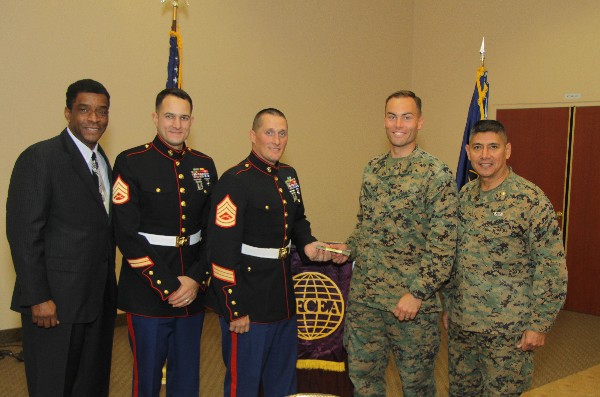 At the December meeting are (l-r) Pete Copeland, assistant chief of staff G-6, Marine Corps Installations West and Marine Corps Base Camp Pendleton; Sgt. Farrell and Sgt. Klepsa; Capt. Cunningham; and Maj. Rick Caneda, USMC, Maintenance Officer I MEF G-6. The chapter raised $840 in toys and cash at the luncheon for the Toys for Tots program.