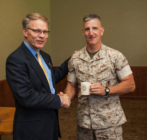 Chapter President Maj. Mark Witzel, USMC (Ret.), and Col. Dowling greet each other following the June luncheon.