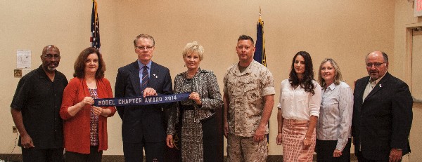 Joining together following the September luncheon are (l-r) Gerald Hampton, chapter webmaster; Vicki Hines, chapter vice president for education; Mark Witzel, chapter president; Shirley Adams, AFCEA Southern California regional vice president; guest speaker Col. Voigts; Alexis Bennetts, chapter Young AFCEAN; Debie Burford, chapter vice president for small programs; and Ben Garcia, chapter vice president for small business.