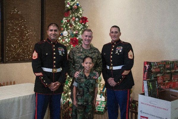 From l-r are Staff Sgt. Michael Castillo, USMC, Col. Roger Standfield, USMC Gunnery Sgt. Matthew Klepsa, USMC, and Eagle Young Marine Pfc. Amaya Morales following the December luncheon.