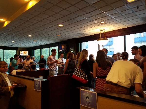 More than 60 people enjoy the chapter's "Embrace Your Geek Day" social in July.