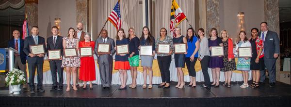 Recipients of the chapter's K-12 grants pause for a photo at the May awards night.