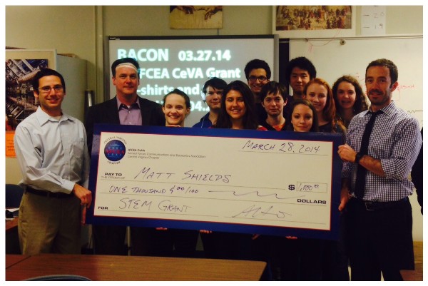 In March, the chapter presents Matt Shields from Charlottesville High School with a STEM Teaching Tools grant to buy a laptop.