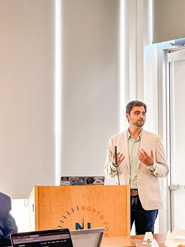 Akshay Prabhu, director of software engineering, Capital One, presents at the University of Virginia Research Park in Charlottesville, Virginia, in July.