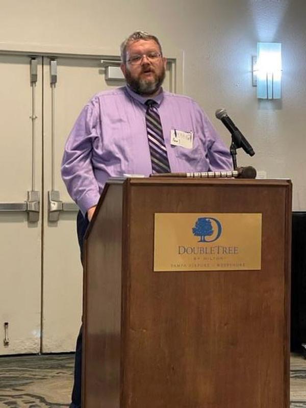 Ward addresses the chapter at the February event. 