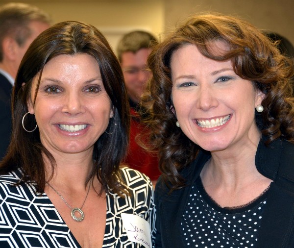 Jami Kirkwood (l) and Margot Blackard enjoying their time at the Women in Intelligence Group social in February.