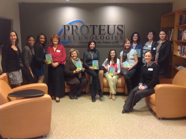 Ladies from the chapter's WIIG Book Club gather at host company Proteus Engineering in January to discuss “Daring Greatly.”