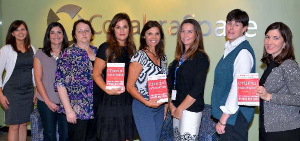 Members of the chapter's Women In Intelligence Group (WIIG) enjoy reading Crucial Conversations: Tools for Talking When the Stakes Are High in September. Photo courtesy of John Garcia.