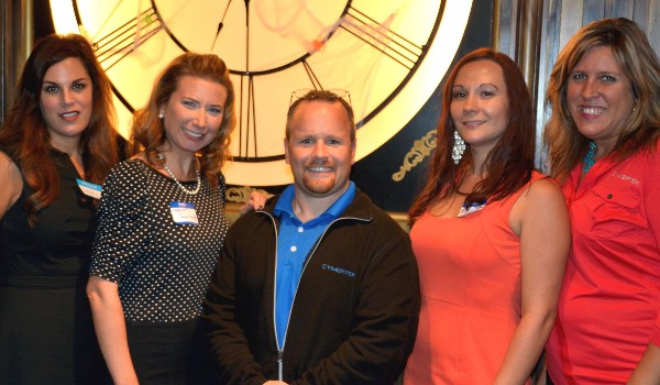Attending the October Women in Intelligence Group (WIIG) social are (l-r) Denise Desien, WIIG vice president; Margot Blackard, WIIG social co-chair; Jason Freedman, president, Cymertek; Erin Horton, WIIG social co-chair; and Roxanne Voorhees, Cymertek.