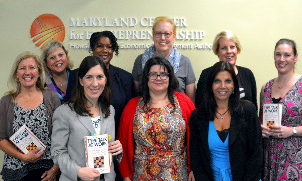 Attending the Women in Intelligence Group book club in June are (front l-r) Kirsten Miller, Shasta Ingram, Jami Kirkwood and (back l-r) Mary Beth Ruch, Colleen Dilly, Maria Muse-Duncan, Gail Sanders, Jen Buchanan and Jennifer Andelman. Photo by John Garcia.