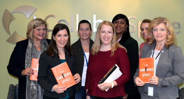 Members of the chapter's Women In Intelligence Group Book Club meet in October to discuss The Confidence Effect: Every Woman's Guide to the Attitude that Attracts Success.