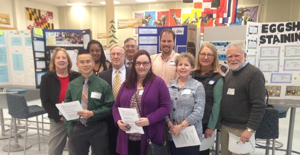 Volunteer judges at the Meade Senior High School science fair in December are (back row l-r) Nikkia Vinston, John Garcia, Steve Simchak, Ellen Brown and Charlie Brown; (middle row l-r) Kathleen Berganski, Gene Besel and Jessica Morgenstern; and (front row l-r) Adam Eng and Karen Young.