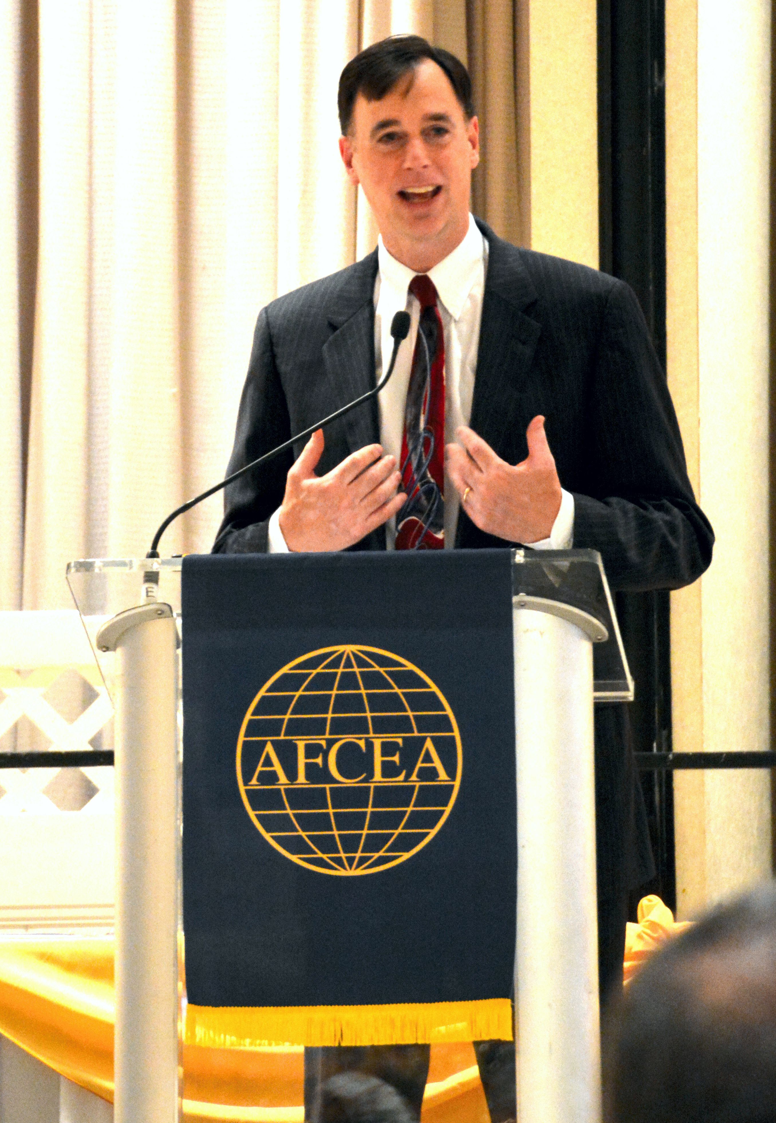 Rob Joyce, White House cybersecurity coordinator, presents the five revolutions of technology at the chapter's annual awards night.