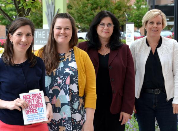 Attending the chapter's Women In Intelligence Group book club in May are (l-r) Kirsten Miller, Laurian Vega, Barbara Petilli and Jen Buchanan. Photo courtesy of John Garcia.