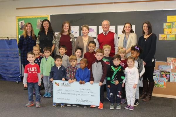 Indian Creek Lower School accepts their STEM grant from the chapter in December. 