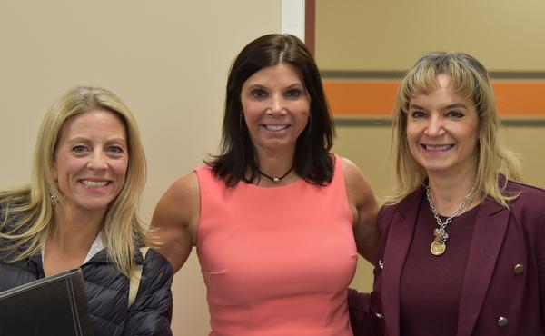 Eyre (l), Kirkwood (c) and Mobley pause for a photo during the WIAM mentoring event in March.