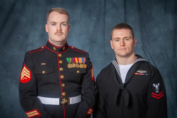 Two enlisted active duty service members receive a Military Scholarship at the May event, including 2nd Class Petty Officer Ashton Goodson (r).